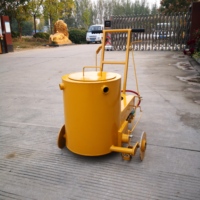 Machine de réparation de nids de poule Équipement d'étanchéité de fissures de route d'asphalte Machine de scellement de fissures de chaussée