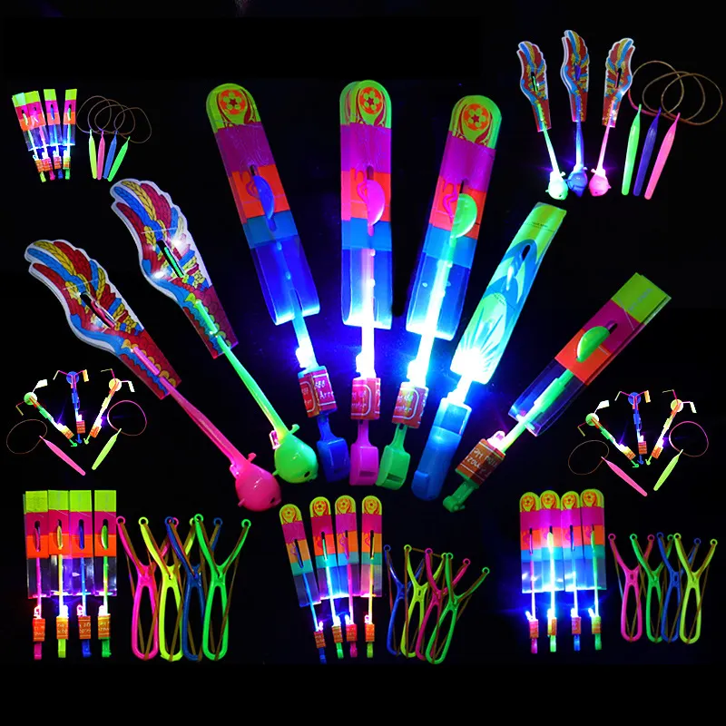 Tirachinas de luces LED con flechas voladoras para niños, juguetes para fiesta de cumpleaños, navidad, regalos de explosión, banda de goma, Catapulta de eyección, volador