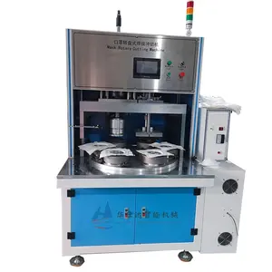 Machine de soudage et de découpe par ultrasons automatique ronde rotative 4200W Machine de masque de tasse pour coton aiguilleté ou tissu non tissé