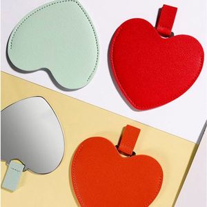 Miroir de maquillage portable pratique en acier inoxydable personnalisé avec logo personnalisable, design en forme de cœur incassable - Product Image 1