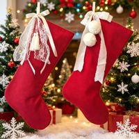 Chaussettes de Noël en gros avec nœuds blancs, ornements suspendus pour la décoration de scènes de Noël