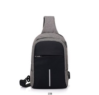 Produit à succès Fournisseur chinois Sac de poitrine pour homme Étanche Fermeture éclair invisible Charge USB Sac de poitrine à bandoulière