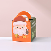 Boîtes de papier d'emballage de cadeau de joyeux Noël de 4 conceptions personnalisées par usine avec la poignée petite boîte de friandises de biscuit de sucrerie pour la partie