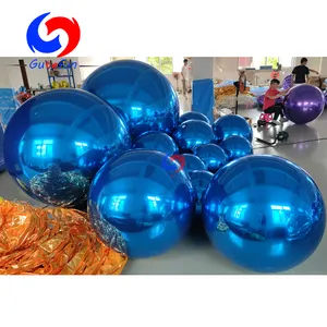 successful event management corporate gathering/wedding/ charity fundraiser decor balloons blue shiny mirror balls