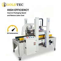 Machine de scellage automatique Goldtec pour cartons de tailles variées avec pliage du couvercle supérieur pour la logistique