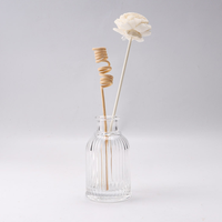 Bouteille en verre transparente simple de 90 ml à surface rayée pour diffuseur de parfum à bâtonnets, idéale pour la maison et l'hôtel