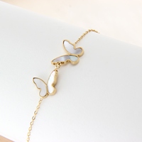 Bracelet tendance pour femme Nabest en acier inoxydable plaqué or 14 carats, étanche, avec perles et breloque papillon coquillage
