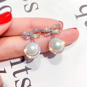 奢华锆石水晶蝴蝶结耳环女性高级耳环气质现代简洁风格珍珠耳环