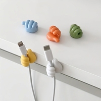 Crochet mural auto-adhésif créatif en silicone en forme de pouce pour clés, organisateur de câbles de données et de fils pour la maison et le bureau