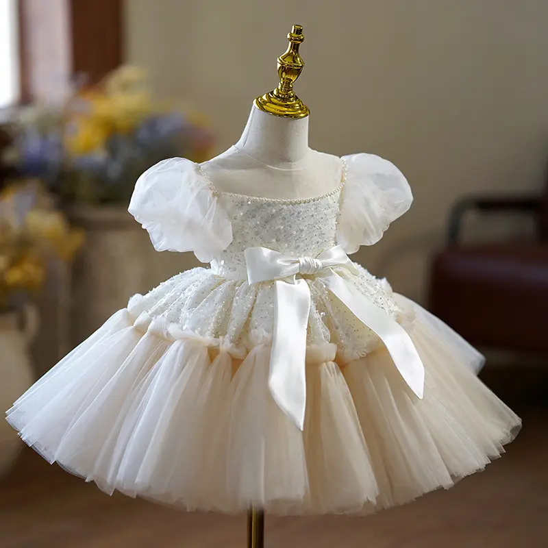 Petit hôte Piano Show princesse porter robe robe à manches courtes bébé filles arc Sequin robe de bal fleur filles robes de mariée blanches