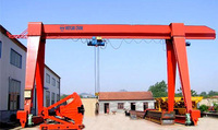 Grue portique mobile d'extérieur pour levage de bobines en acier, capacité 10 tonnes, avec palan à câble en acier pour manutention de caisses