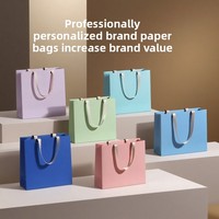 Sac cadeau en carton blanc biodégradable personnalisé de haute qualité avec impression couleur pour l'emballage des bougies