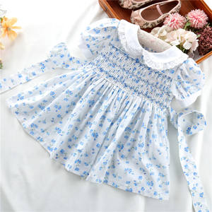 Robes d'été smockées pour filles, motif floral, robe bébé bleu ciel, vêtements décontractés vintage pour enfants, vente en gros, B114313 - Product Image 1
