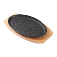Fabrication de plaques de cuisson et de gril en fonte pré-assaisonnée de petite taille Plaque métallique grésillante