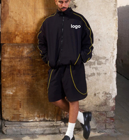 Ensemble de survêtement de course noir personnalisé en nylon avec piping réfléchissant, veste coupe-vent et short de jogging pour hommes
