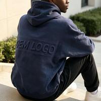Hoodie Fleece Warna Solid Model Drop Shoulder dengan Cetakan Timbul