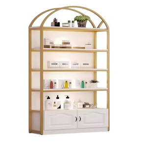 Étagère de présentation cosmétique de luxe avec cadre doré, présentoir autoportant arqué avec <span class=keywords><strong>armoire</strong></span> de rangement pour les boutiques de beauté - Product Image 5