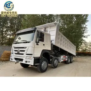 Sinotruk HOWO Left Hand Drive with mounted cranes 10wheels 6X4 8X4 375HP Diesel Engine Tipper Dump Truck for sale in tanzania