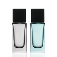 Vente en gros de flacons de parfum en verre transparent de luxe personnalisés OEM 30ml 50ml 100ml avec atomiseur et couvercle pour cadeau