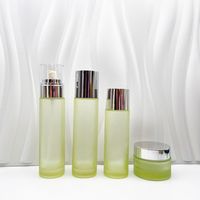 Bouteille d'émulsion en verre dépoli de haute qualité de luxe de couleur jaune rose avec tête de pompe à collier en argent rose pour crème pour le visage