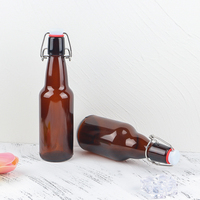 Bouteille de vin ou de bière en verre ambré vide de qualité alimentaire 330 ml 33 cl avec bouchon à bascule
