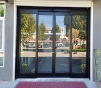 Porte automatique en alliage d'aluminium avec verre, porte d'évacuation d'urgence pour entrée de gare