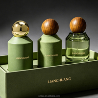 Flacon de parfum en verre cylindrique vert mat de luxe vide avec bouchon à bille en bois et bouchon à bille en métal, bouchon personnalisé et coffret cadeau