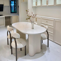 Table à manger de luxe moderne minimaliste crème Wabi-Sabi, panneau français, colonne en forme de cacahuète, chaise ovale en ardoise, cadre en bois massif, personnalisable