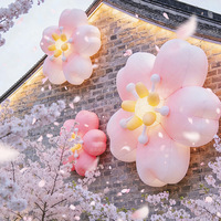 Modèle gonflable lumineux en forme de fleur de pêcher rose pour décorations extérieures de centres commerciaux et vitrines