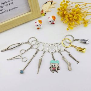 SY2827 Creative <b>Mini</b> Dental Molar Tooth Shaped Keychain Teeth Metal Key Chains Dental Promotional Gifts Dentist Keychain - Product Image 5