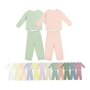 Vente en gros Ensemble de vêtements pour enfants en tissu bambou deux pièces à manches longues pour bébés de couleur unie et douce pour filles