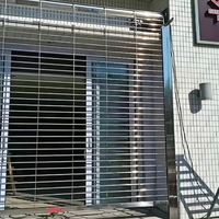 Porte à enroulement en acier inoxydable SUS304, grille ventilée antivol pour magasin, devanture de magasin