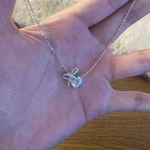 S925 Pure <b>Silver</b> Bow Love Pendant <b>Necklace</b> for Women Sweet Niche Design High-End Zircon Light Luxury Collarbone <b>Chain</b> Accessory - Product Image 1