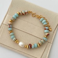 Bracelets de haute qualité imperméables multicolores en perles naturelles et en perles de plastique pour femmes Bijoux tendance de la fabrique