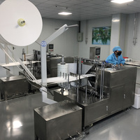 Machine d'emballage automatique pour lingettes alcoolisées avec découpe de tissu non tissé