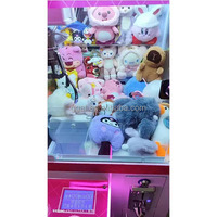 En gros, mini machine de jeu d'arcade à monnayeur pour bonbons et grue à peluches, économique, avec lecteur de billets, pour enfants