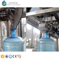 Ligne de production de remplissage d'eau pure en bouteille de 20 litres (5 gallons) entièrement automatique 600 BPH