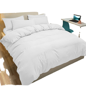 Parure de lit quatre pièces unie de luxe avec housse de couette et drap-housse en coton lavé à motif imprimé - Product Image 1