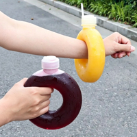 Bouteille de boisson en plastique PP de 500 ml (16 oz) pour thé au lait ou jus, avec logo personnalisé, résistance aux hautes températures, forme ronde en forme de beignet