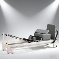 Reformer de Pilates en bois blanc écologique avec système à rail complet et tapis antidérapant pour un entraînement corporel complet en toute sécurité