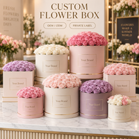 Boîte à fleurs ronde multi-tailles avec bordure dorée, logo personnalisé, en carton rigide pour présentation florale