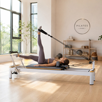 Camas de Pilates de Grado Comercial Blancas con Plataforma de Salto para Entrenamiento en Gimnasios y Yoga