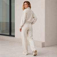 Conjunto de dos piezas OEM ODM para mujer: Sudadera de algodón tipo avena con cremallera de un cuarto y pantalones de chándal de cintura alta de pierna ancha estilo streetwear.