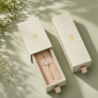 Boîte cadeau haut de gamme en velours pour bijoux, avec doublure en éponge dorée, gaufrage et impression offset, écologique, pour bagues de fêtes