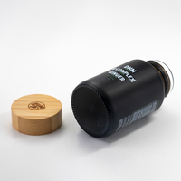 Bouteille ronde en verre 100cc 120cc 150cc avec couvercle en bambou Emballage gommeux de capsule de supplément de vitamine et de santé