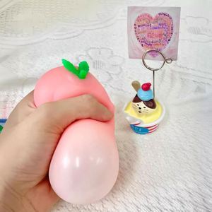 โมจิสควิชชี่ขนาดเล็กน่ารัก สีชมพูพีช ของเล่นบีบคลายเครียดสำหรับเด็ก - Product Image 3