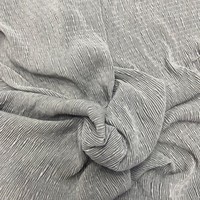 100% polyester 3D texturé plis plissés tissu tissé en relief pour vêtement femme
