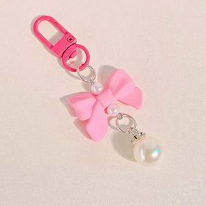 Wholesale Luxury PVC Bow Keychain Carabiner Keyring with Small Pearl Pendant for Bags and Cars - Product Image 4