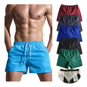 Pantaloncini da spiaggia in tinta unita da uomo di qualità all'ingrosso pantaloncini da bagno impermeabili ad asciugatura rapida pantaloncini da nuoto sport da surf sopra il ginocchio