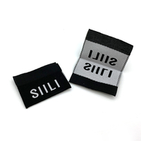 Fabricant d'étiquettes damassées tissées étiquettes textiles personnalisées marques de vêtements Logo couverture de livre étiquette tissée pliée pour robe